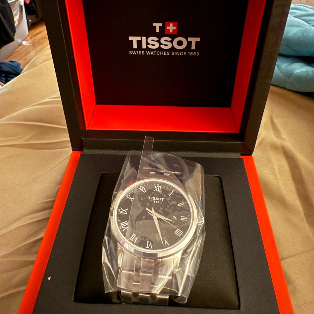 Tissot Black and Silver Luxury Timepiece